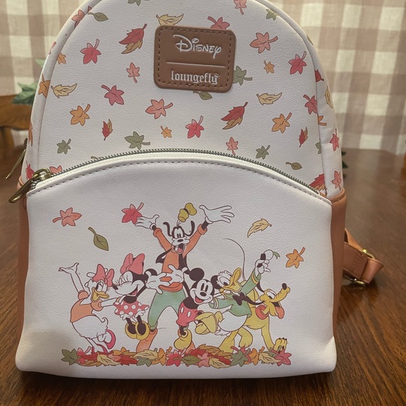 Loungefly Handbags - Loungefly Cream and Brown Disney Mini Backpack Mickey Minnie and friends